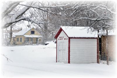 One of the Cart house's. Cart's carried the fire hose to hydrants in case of fire.